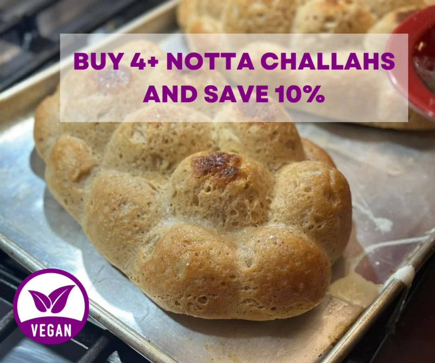 Baked loaves of bread on a baking tray with promotional text overlay.